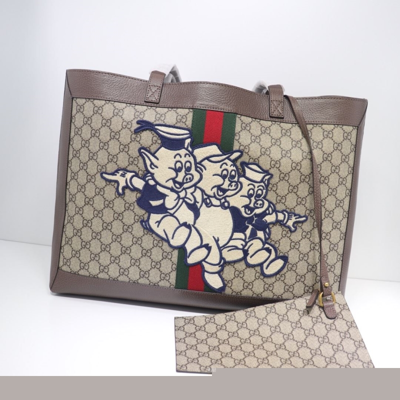 G*u*i shopping bags